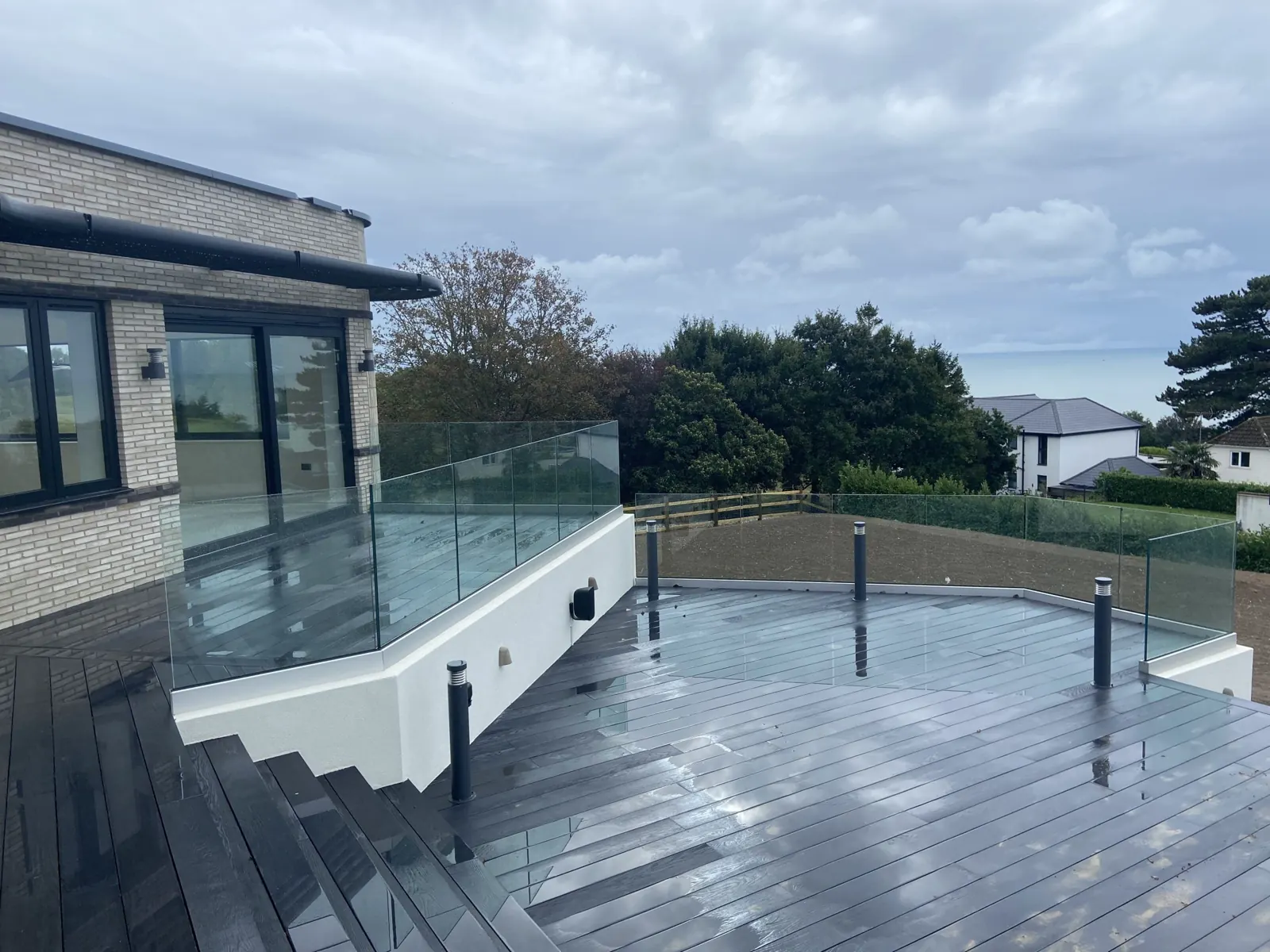 Curved frameless terrace balustrade