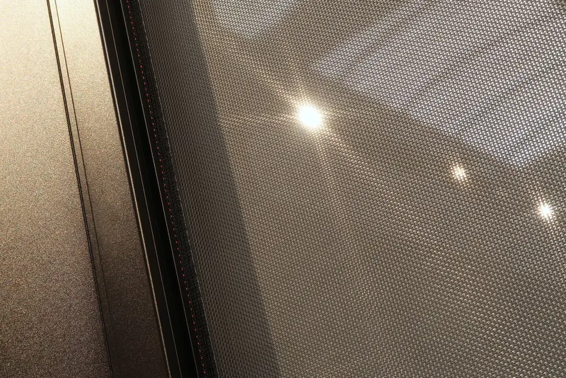Detail of Deponti Screen mesh fabric and side channel with light reflecting on the weave